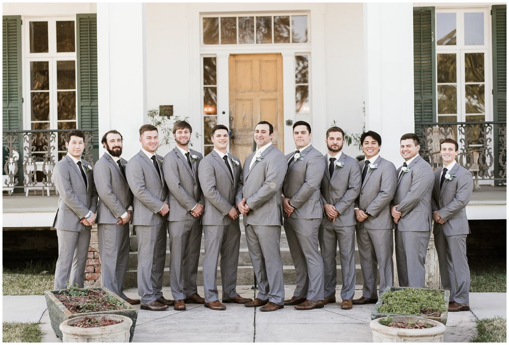 groomsmen in gray suits for winter wedding