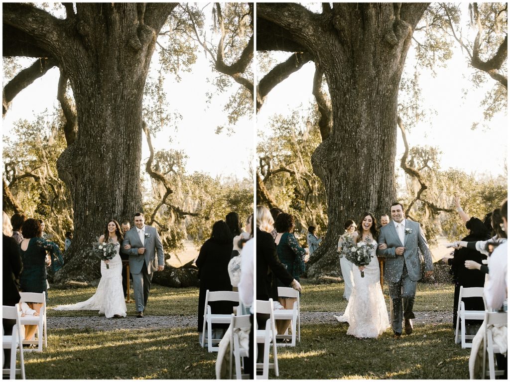 couple walks up the aisle after ceremony at Ducros plantation in louisiana