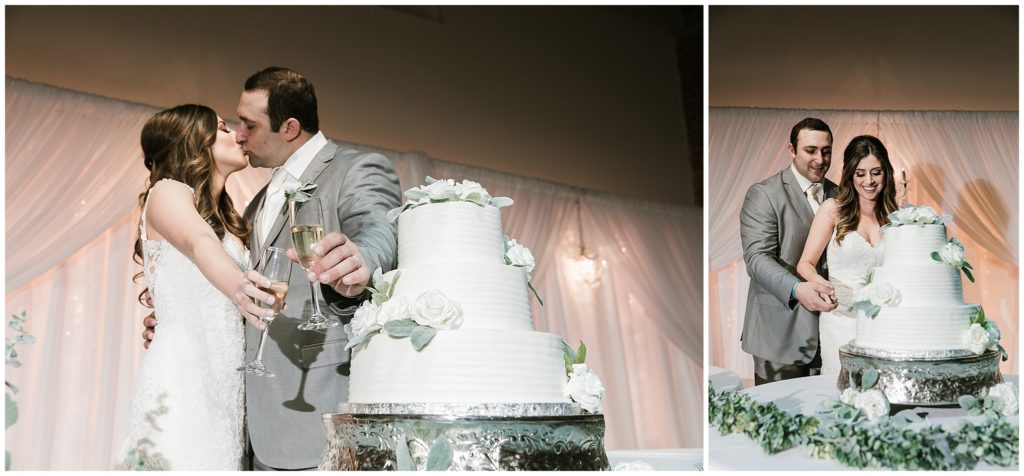 bride and groom toast with champagne and cuts three tier wedding cake