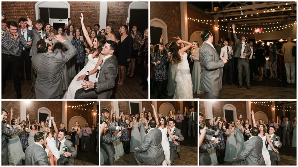 groom tosses garter at wedding reception 