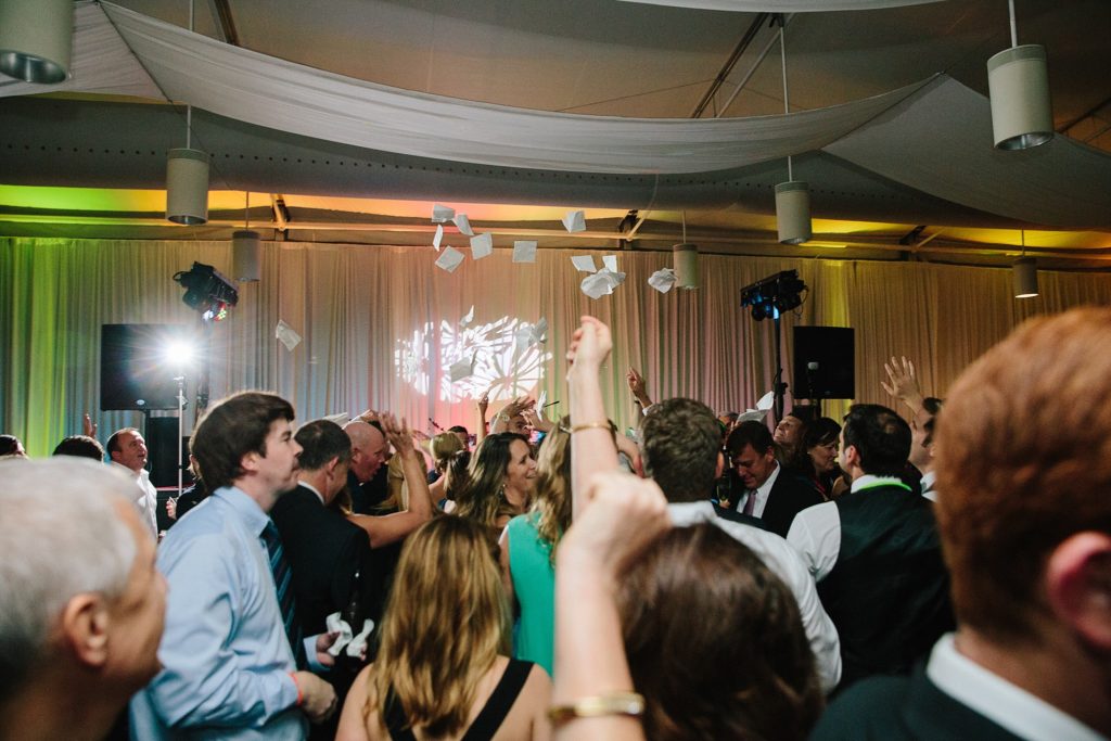 wedding guests celebrate at reception in the arbor room at new orleans city park