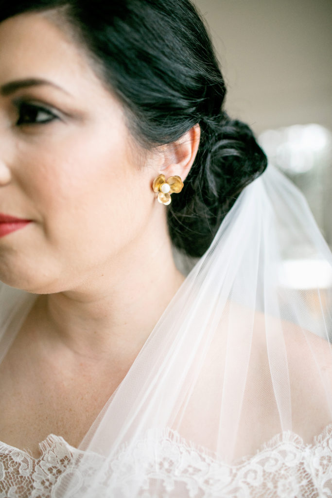 bride wearing hushed commotion earrings