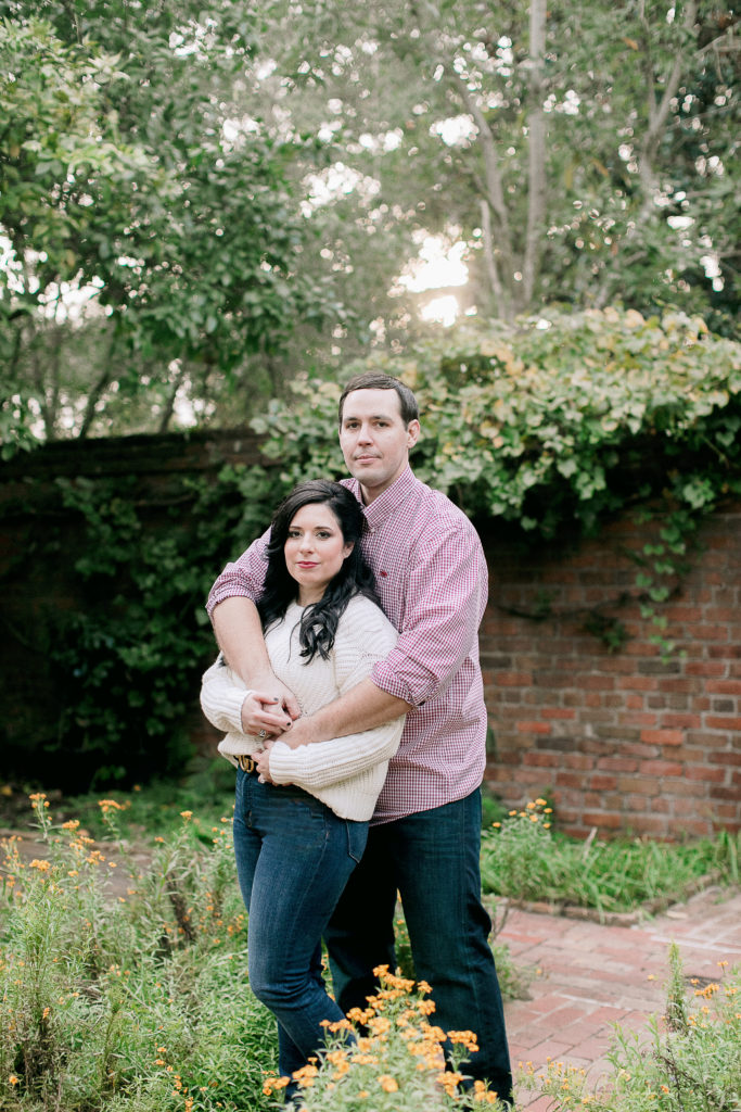 couple poses at Longue Vue gardens in New Orleans