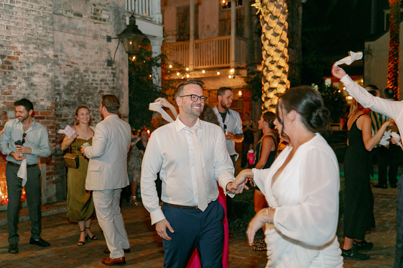 Guest dancing during reception at Race and Religious Wedding 